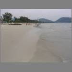 Patong beach itself, a long sandy stretch with many an umbrella